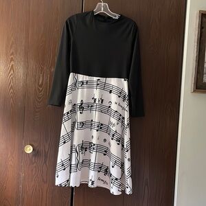 Sucrafas musical pattern long sleeved dress. Size Medium